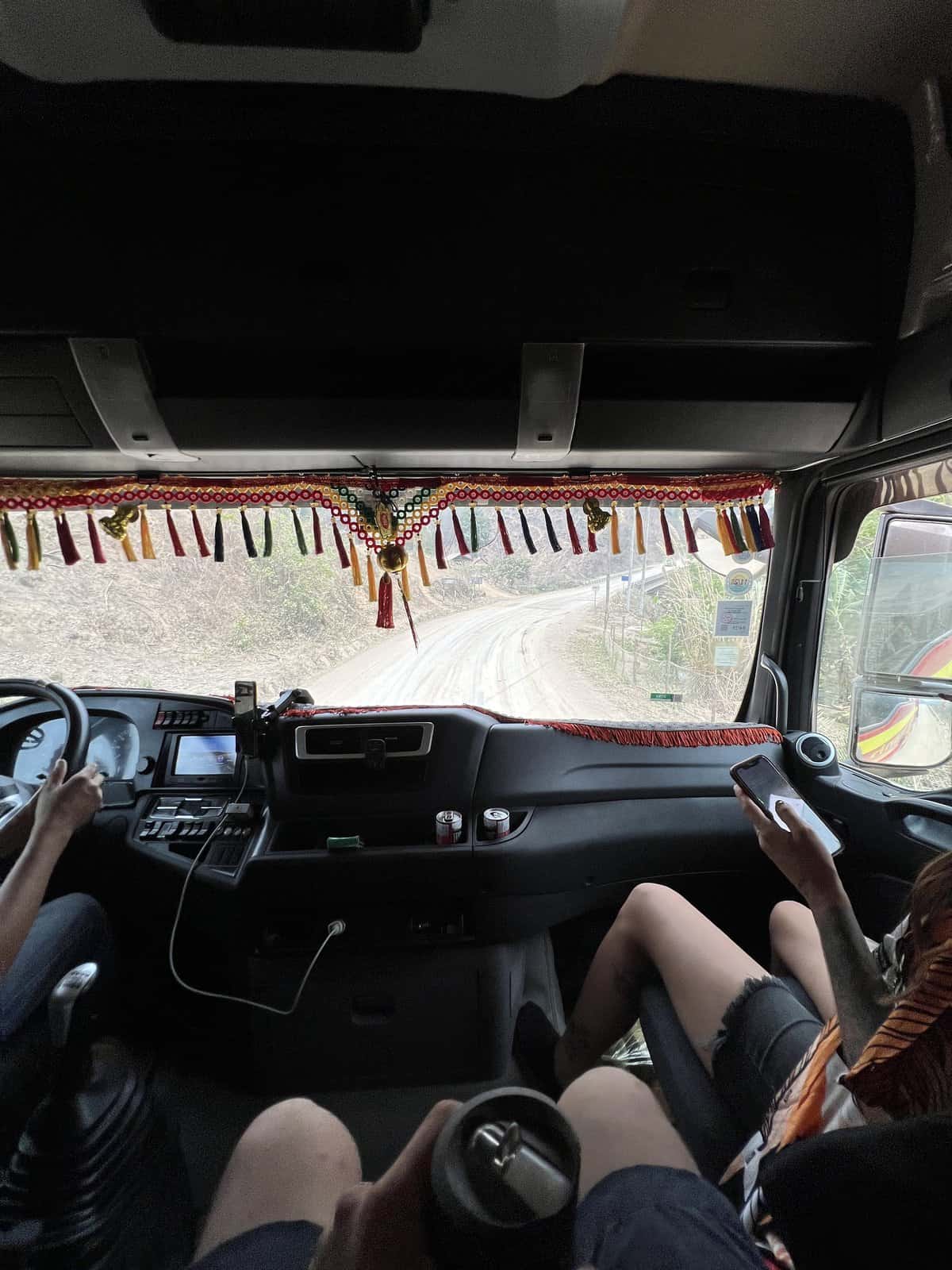 Hitchiking in a semi-truck from Vang Vieng